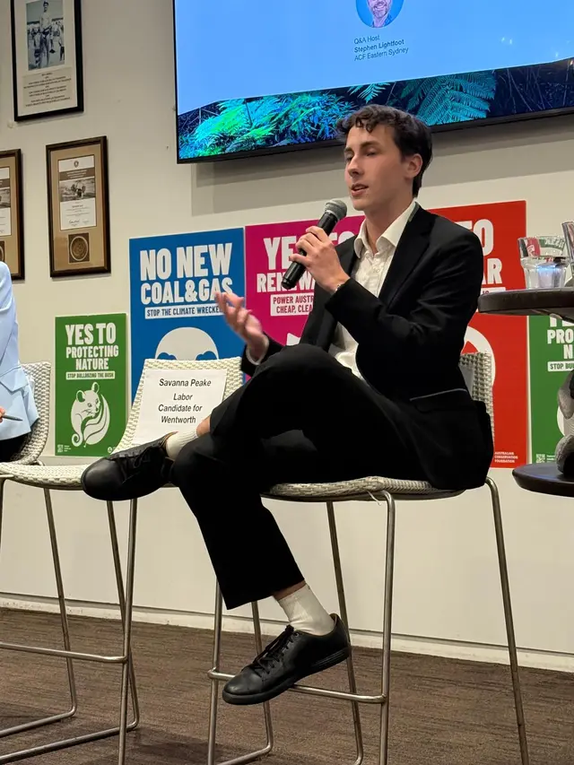 Michael speaking at a candidates panel